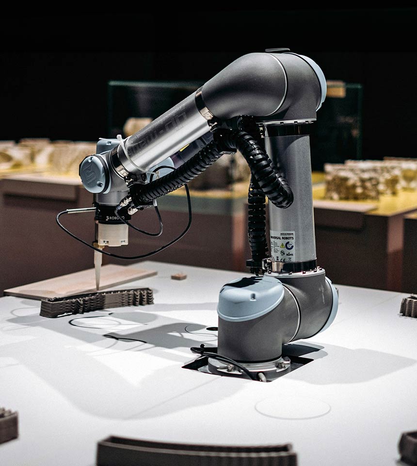 Man Using Measuring Tape in Factory Setting